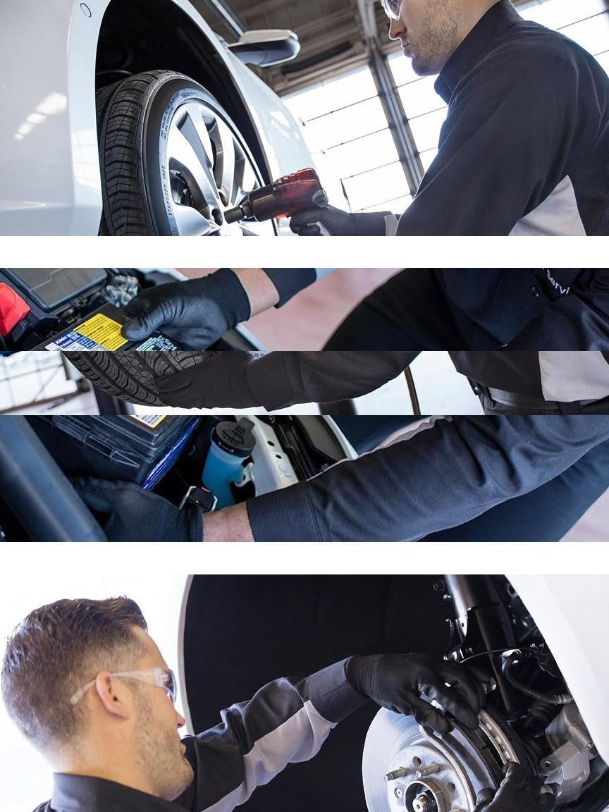 technicians doing car servicing